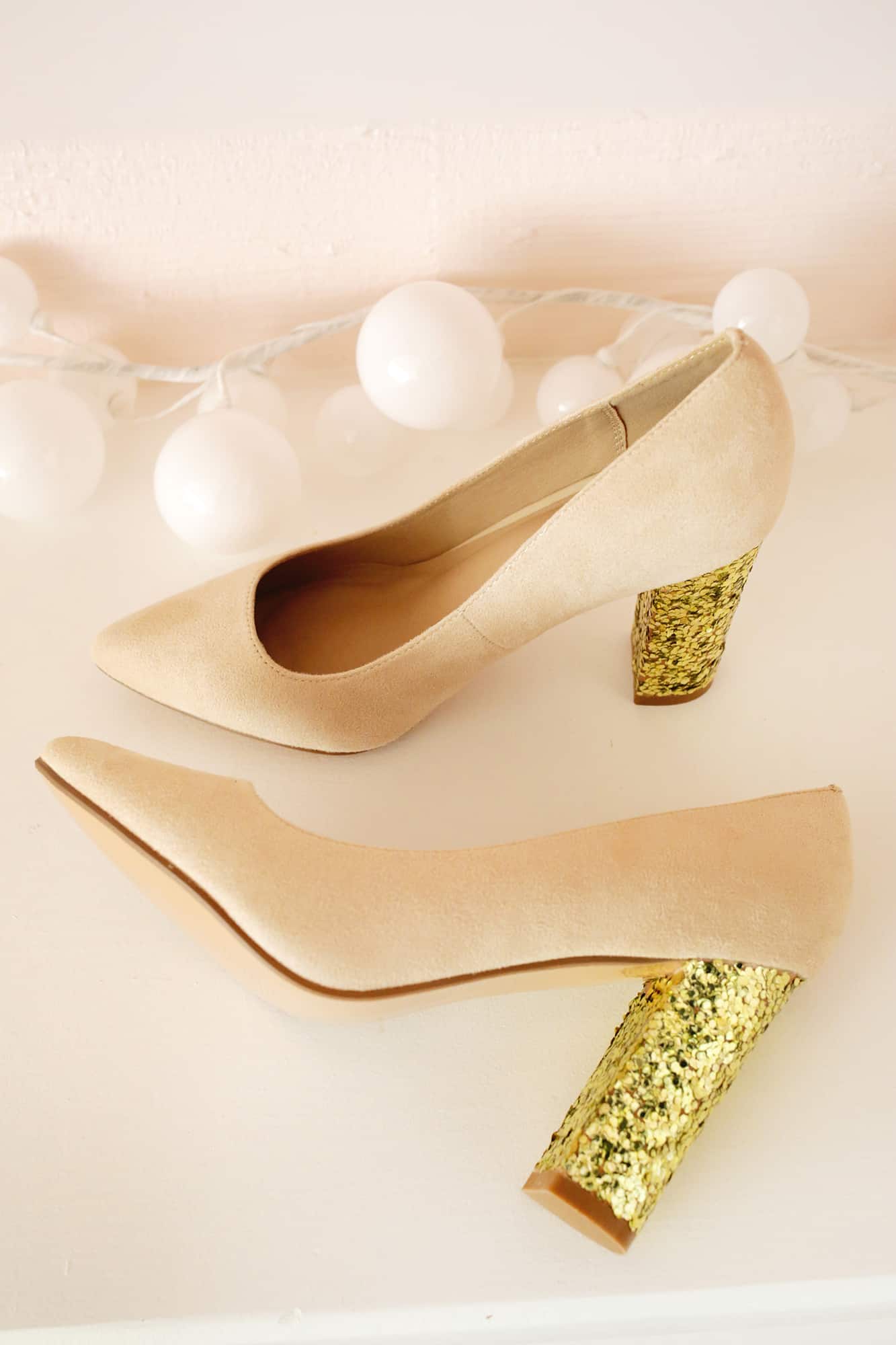 Shoes with gold glittered heels