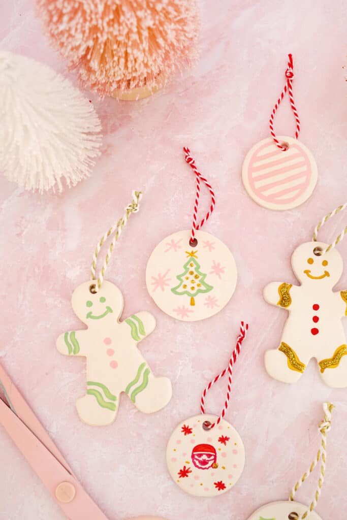 circle and gingerbread people shaped clay ornaments