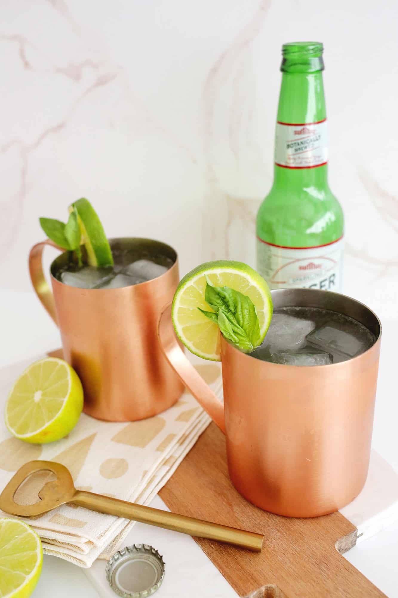 moscow mule drinking from copper cup