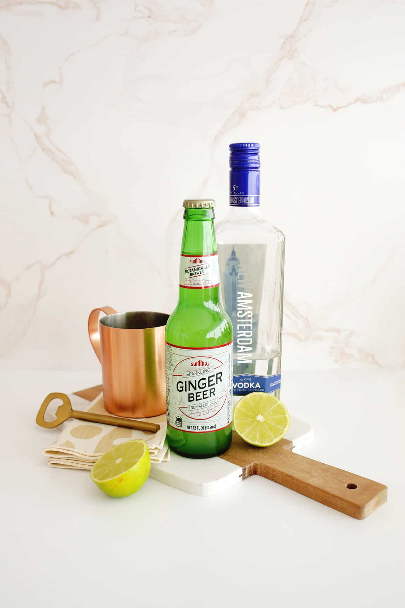 moscow mule drink ingredients with copper cups