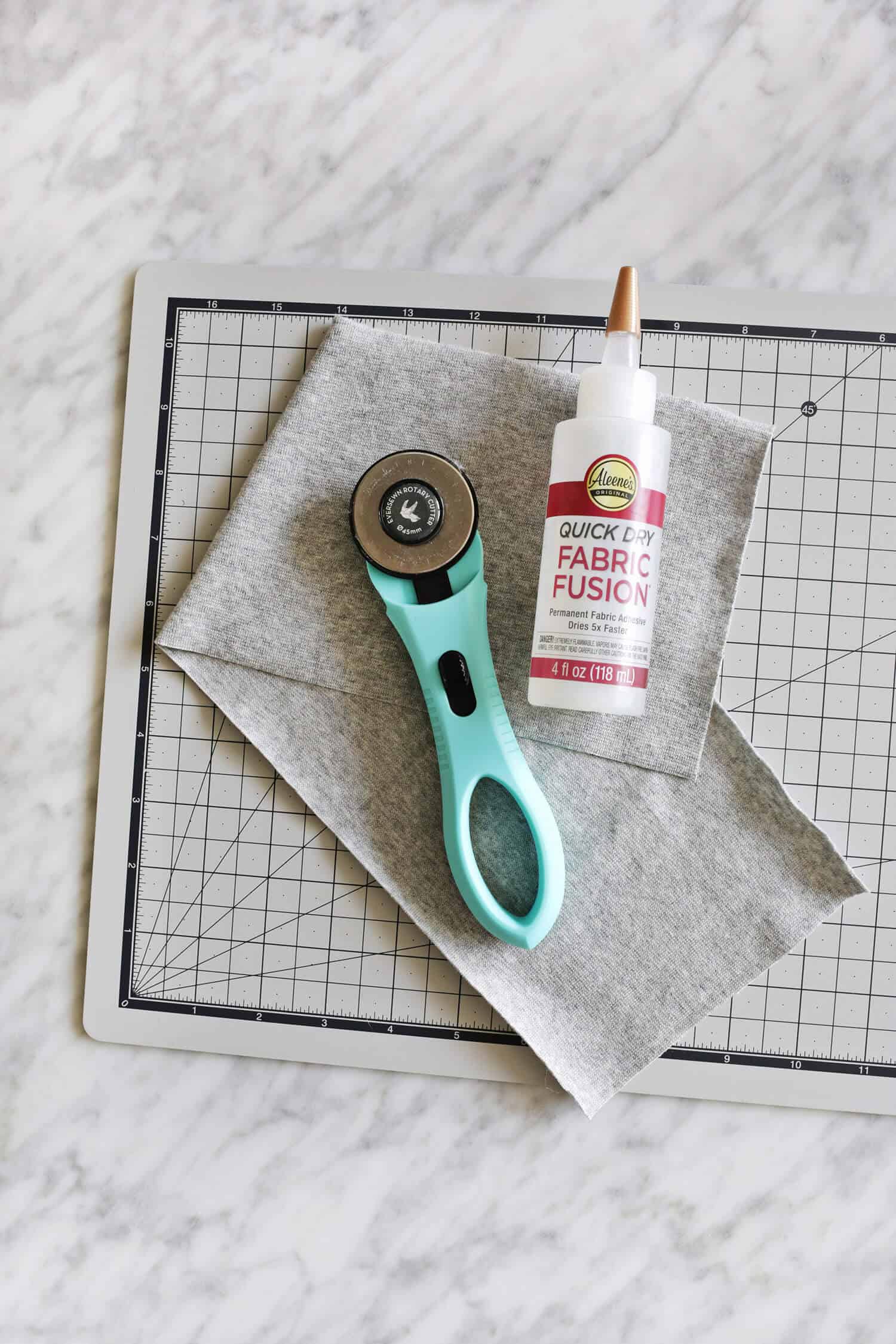 fabric glue and rotary cutter
