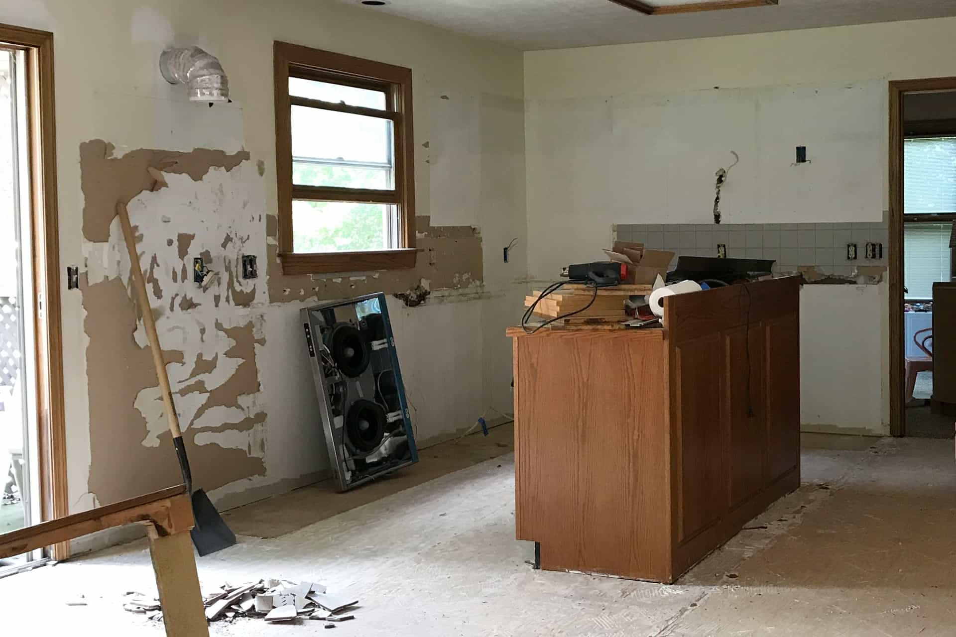 kitchen being renovated with cabinets torn out