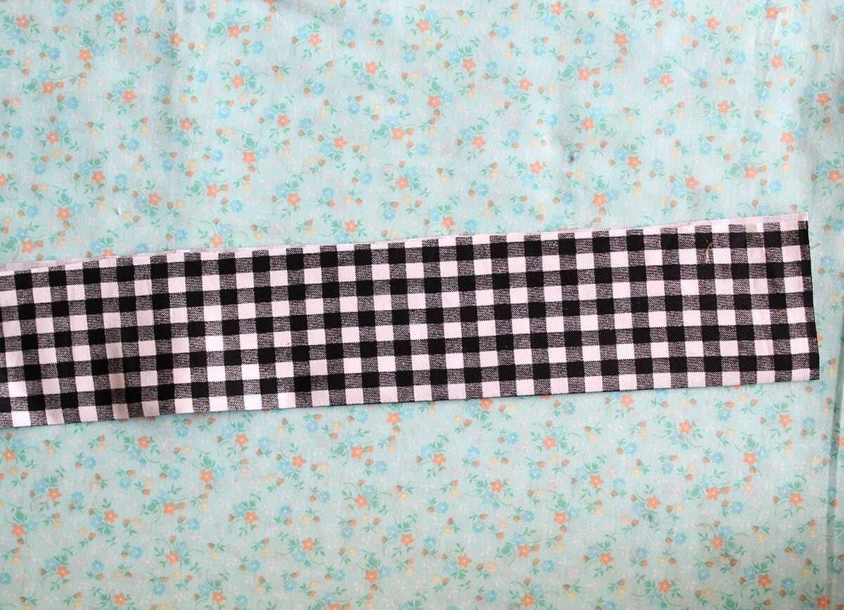 a long piece of black and white checkered fabric