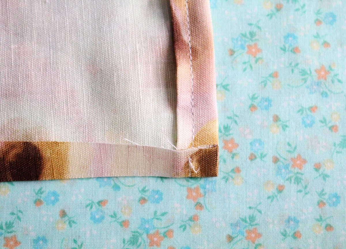 the back side of the flower fabric with the hem sewed together