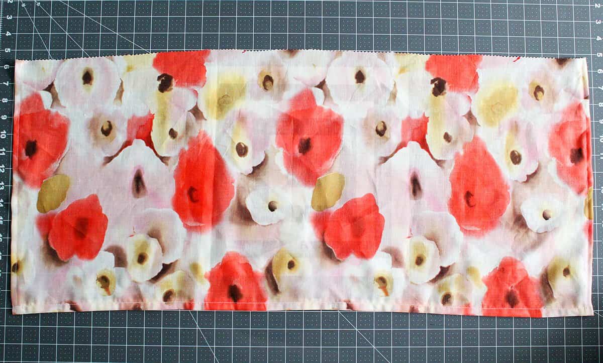 flower fabric on a cutting board