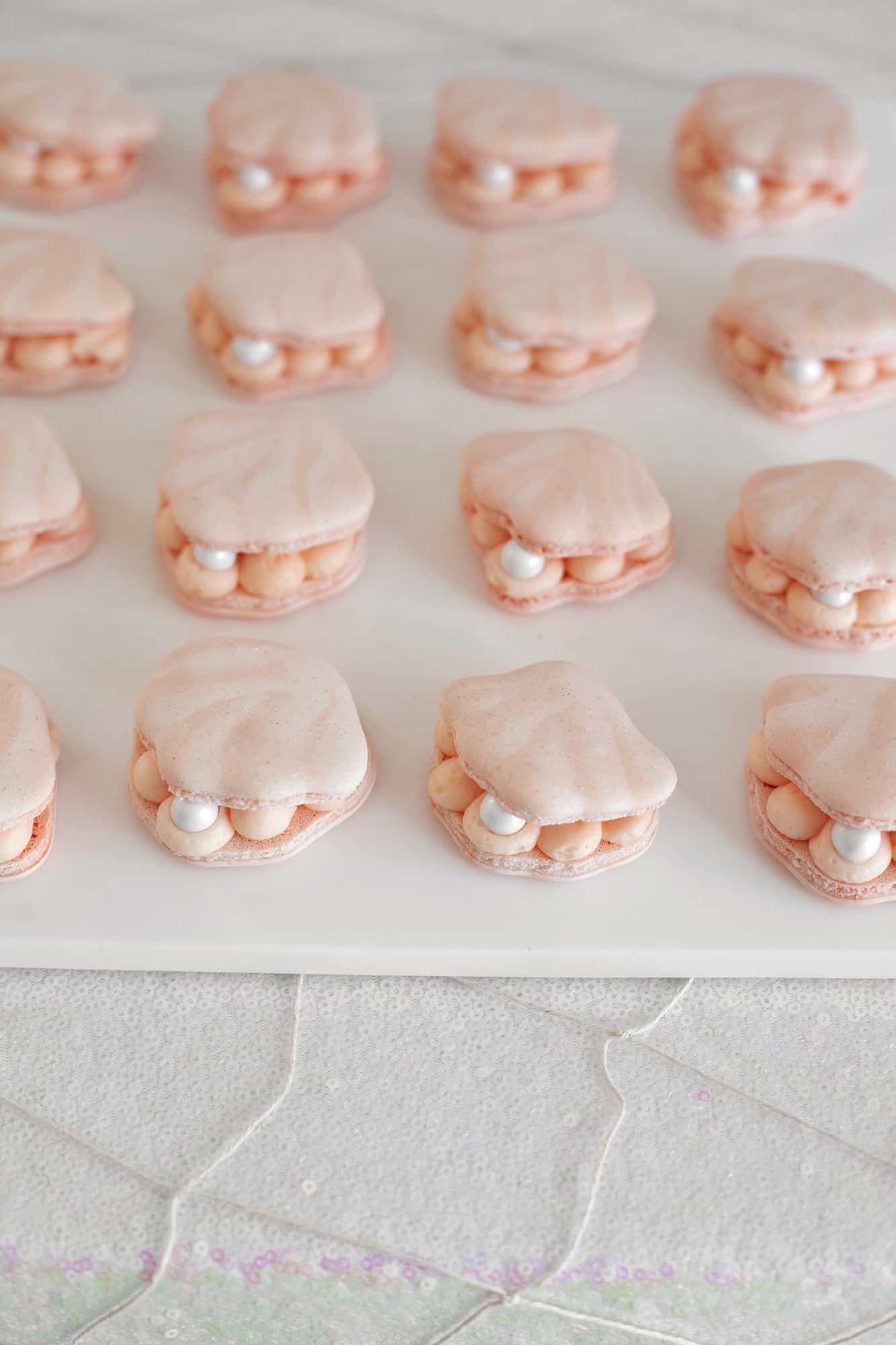 shell shaped macarons with chocolate pearls