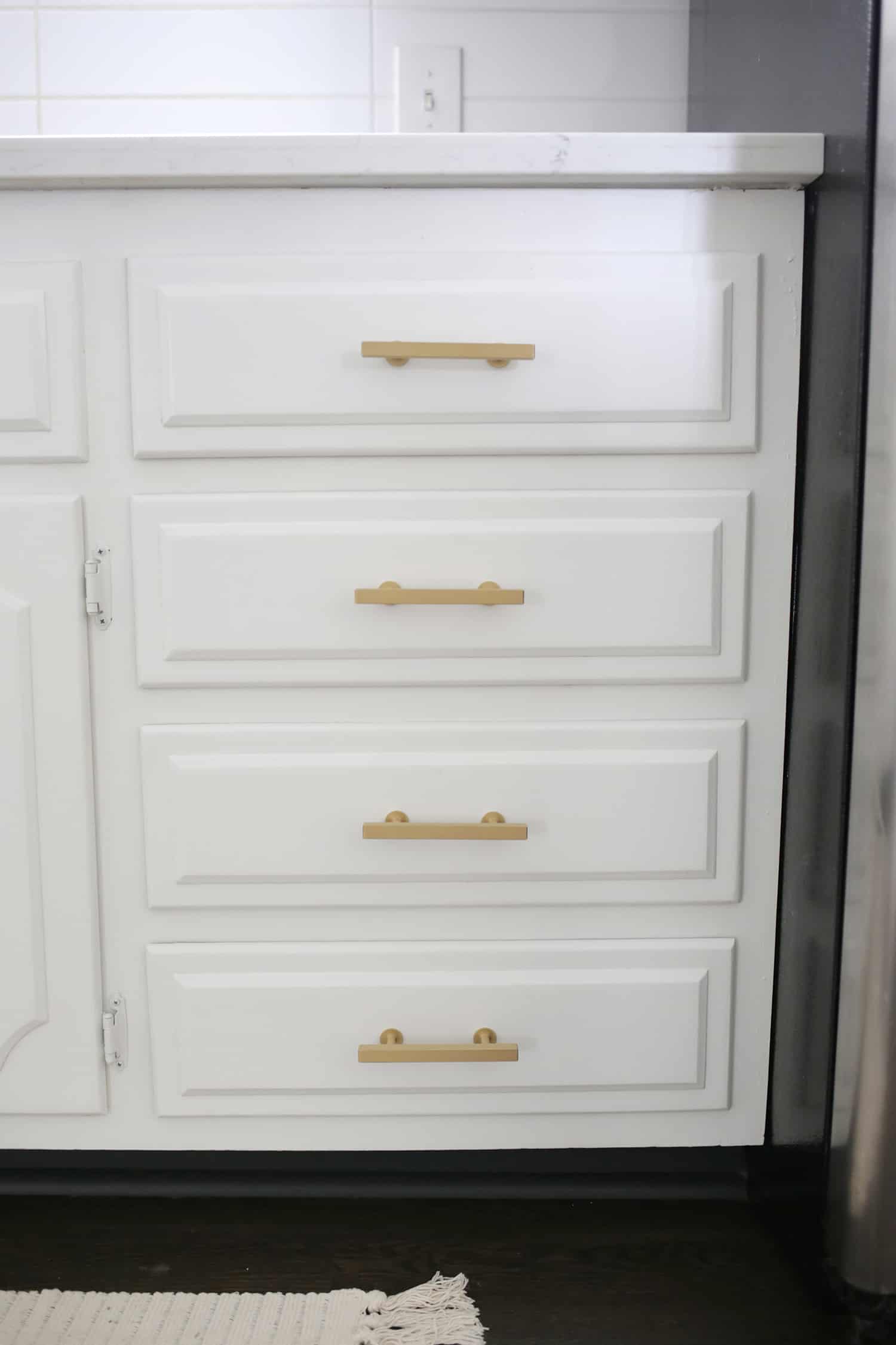 white drawers with gold handles