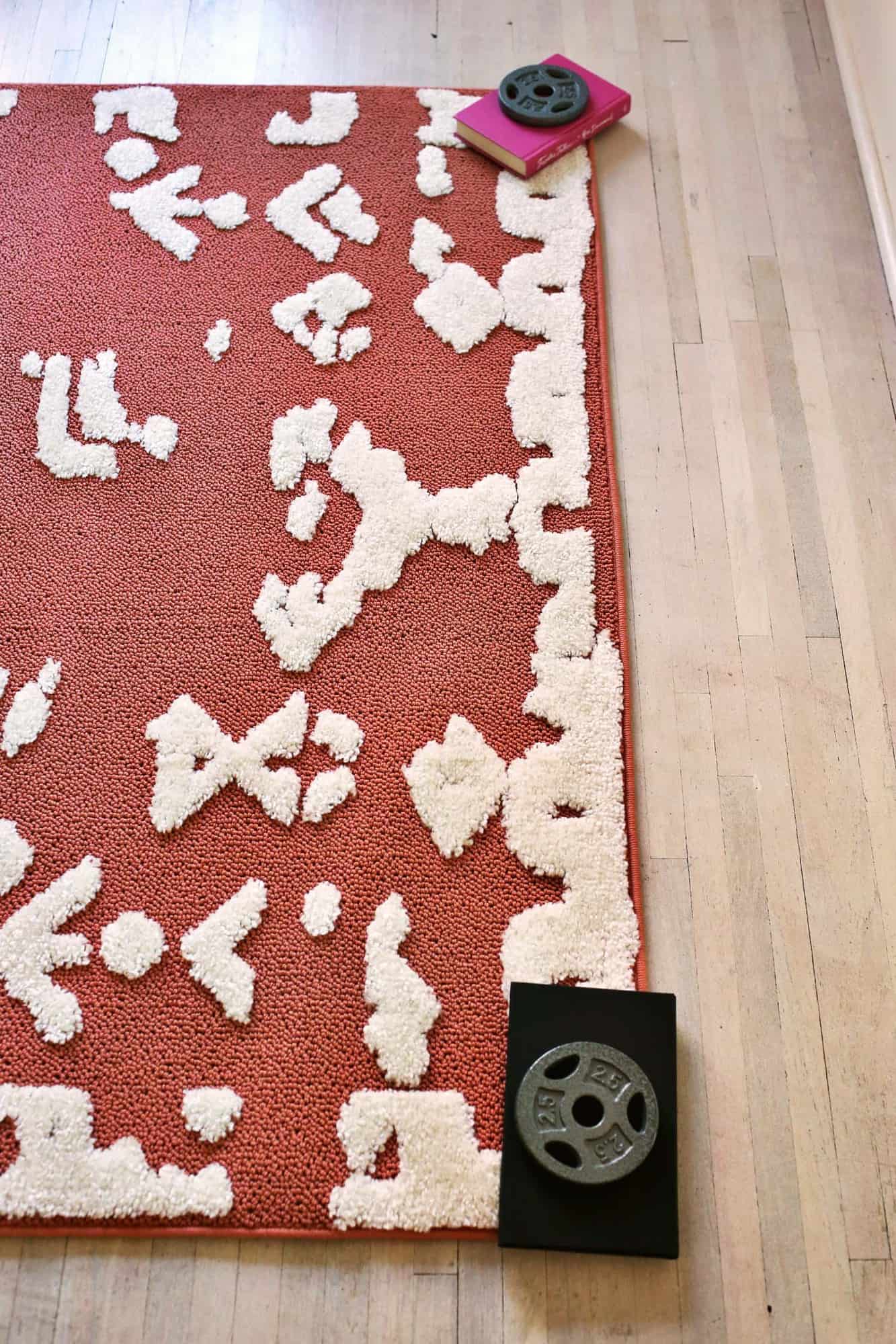 How to Uncurl a New Rug - A Beautiful Mess
