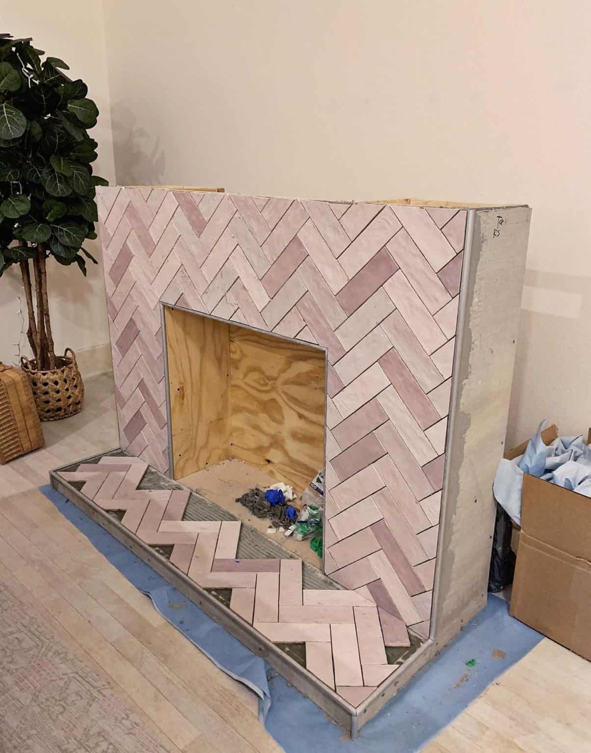 DIY Faux Fireplace with Herringbone Tile - A Beautiful Mess