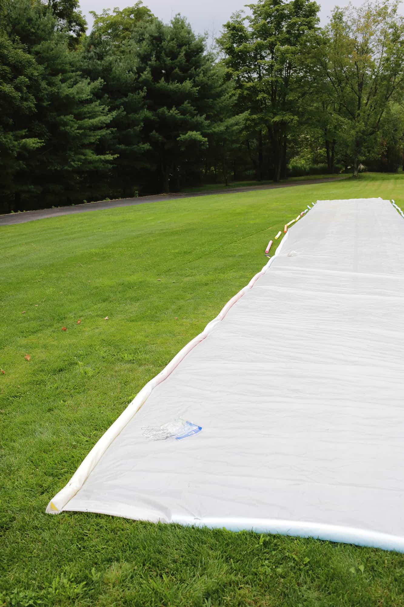 Giant 100 Foot Slip And Slide DIY click through for tutorial 1 10
