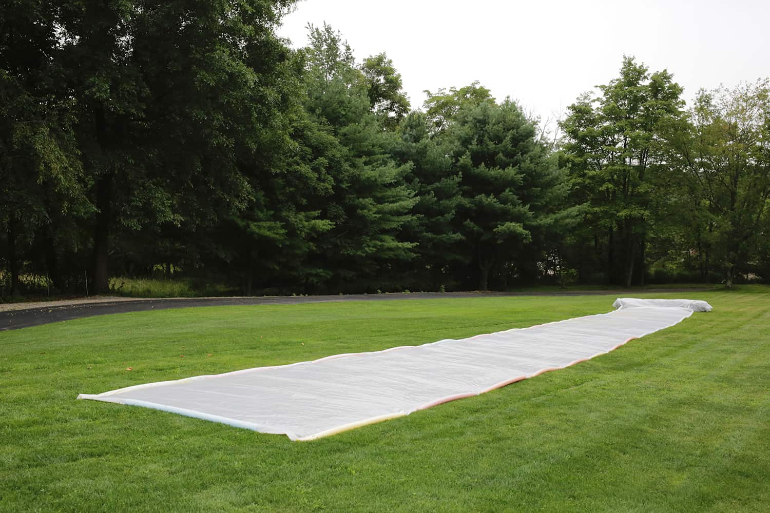 Giant 100 Foot Slip And Slide DIY click through for tutorial 1 7