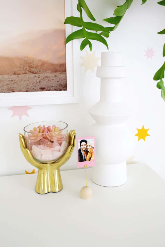 vase, planter, and photo on dresser