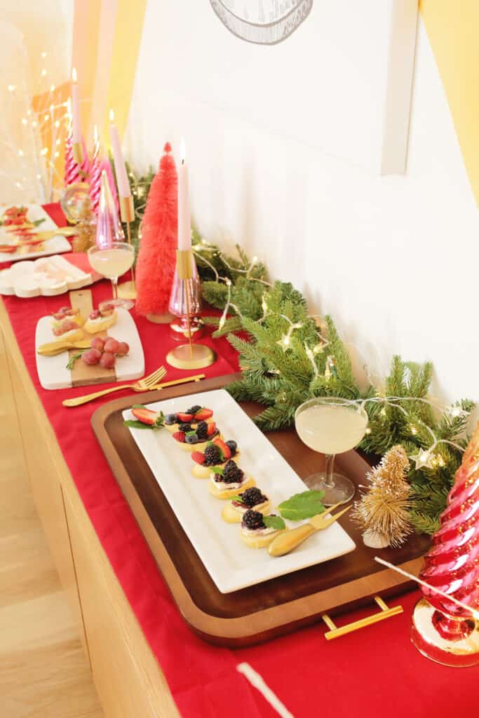 table of crostini appetizers and holiday decor