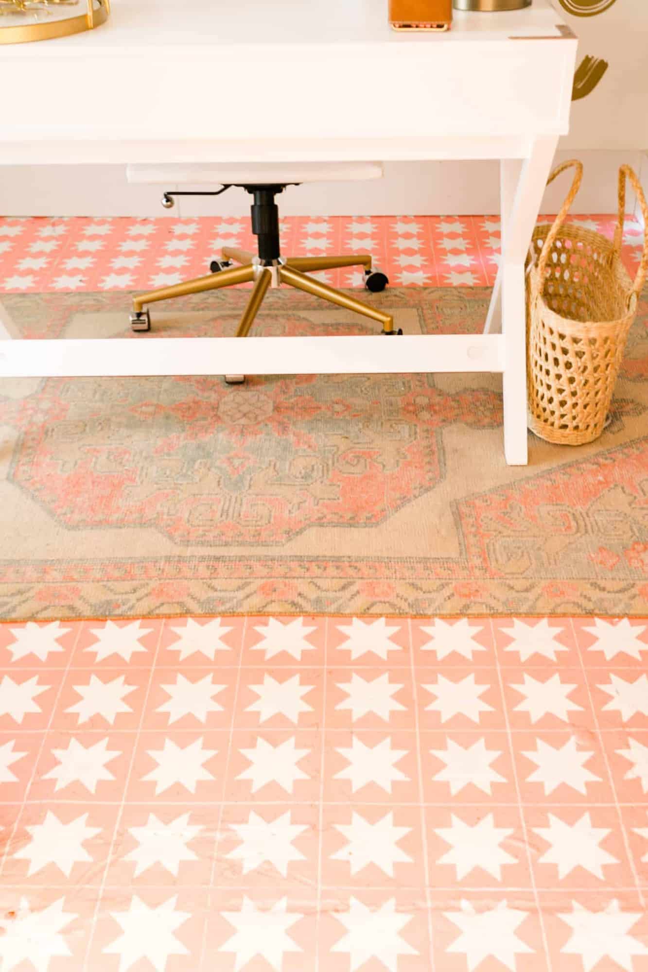 a star tiled floor with vintage rug