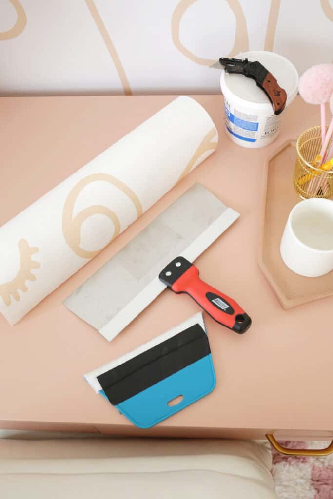 tools for wallpapering a wall