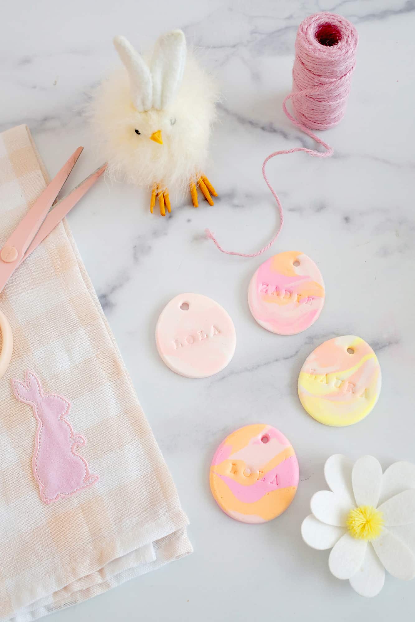 air dry clay name tags shaped like marbled eggs