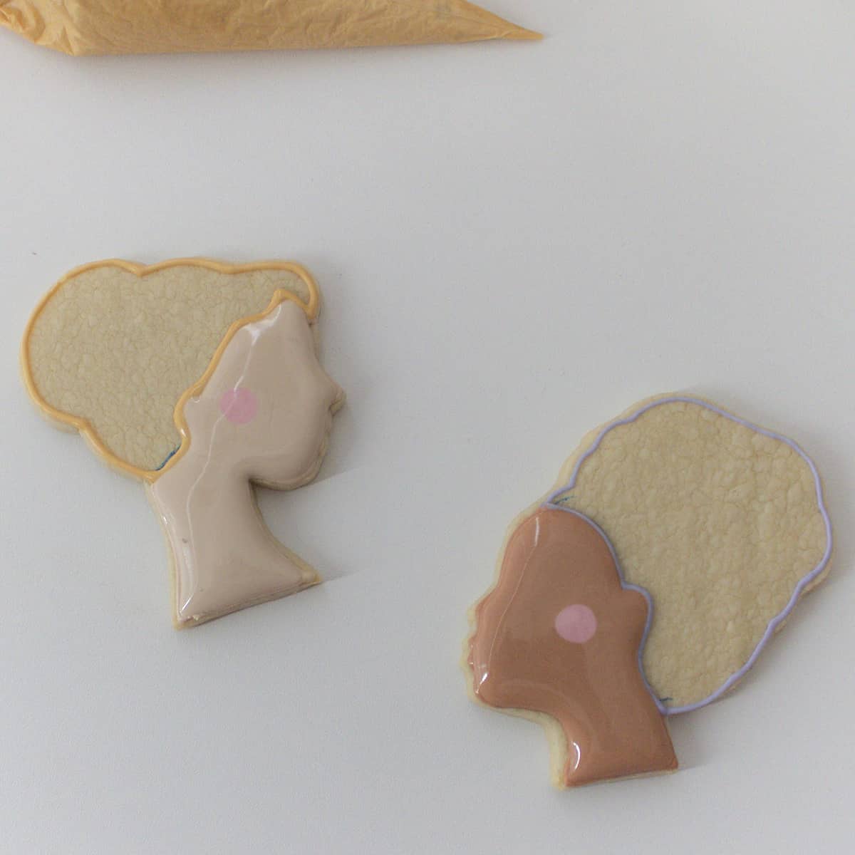 adding icing to silhouette cookies