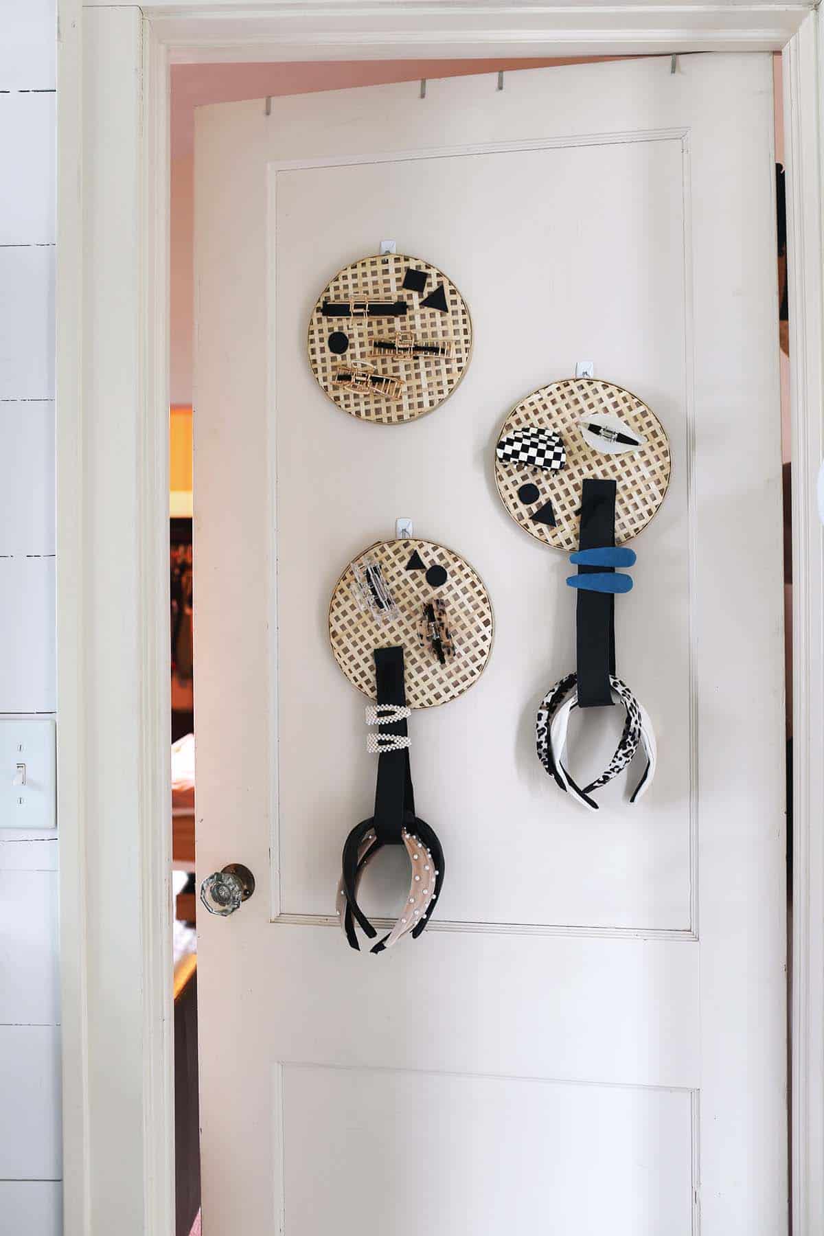 DIY hair accessory holders hanging on door
