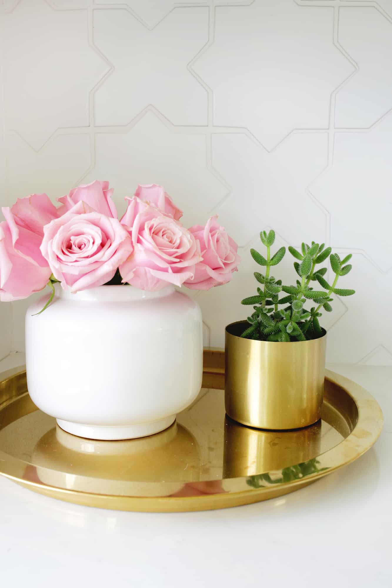 pink roses on gold tray