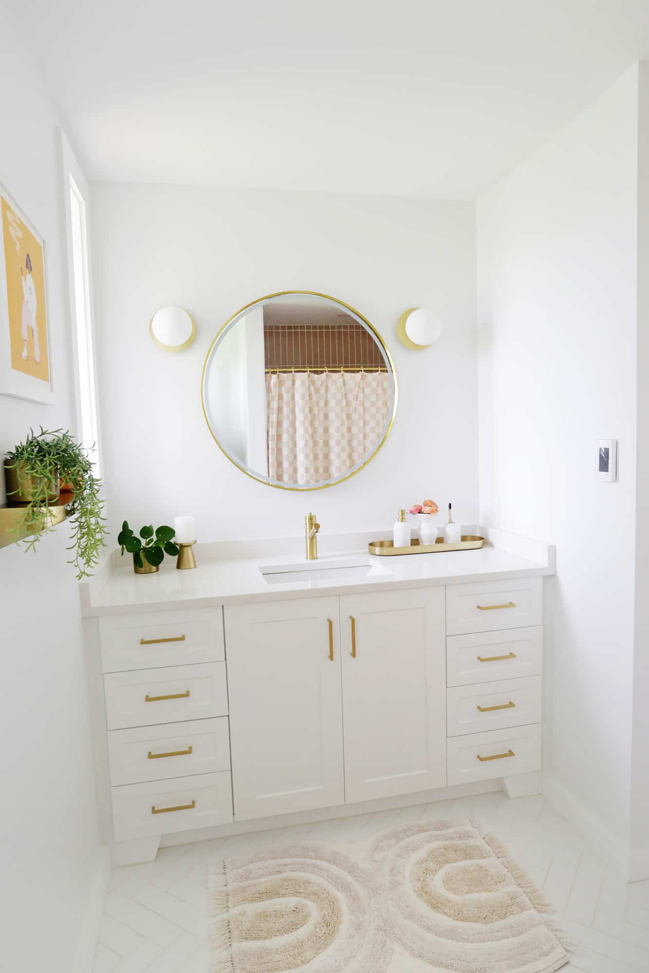 Bright bathroom with gold fixtures