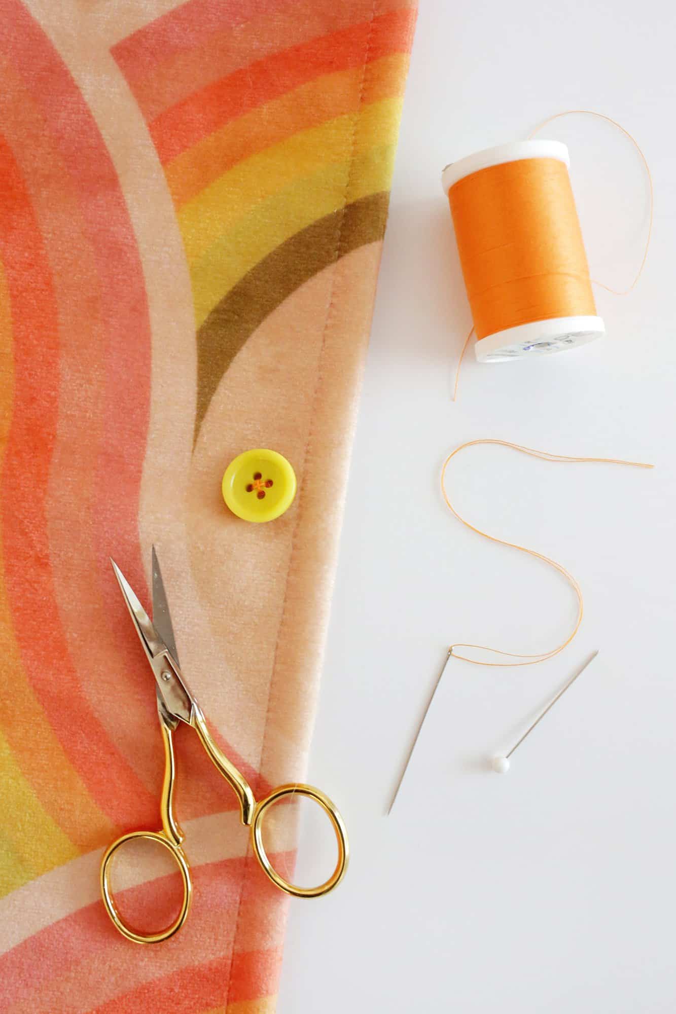 a button sewn onto fabric