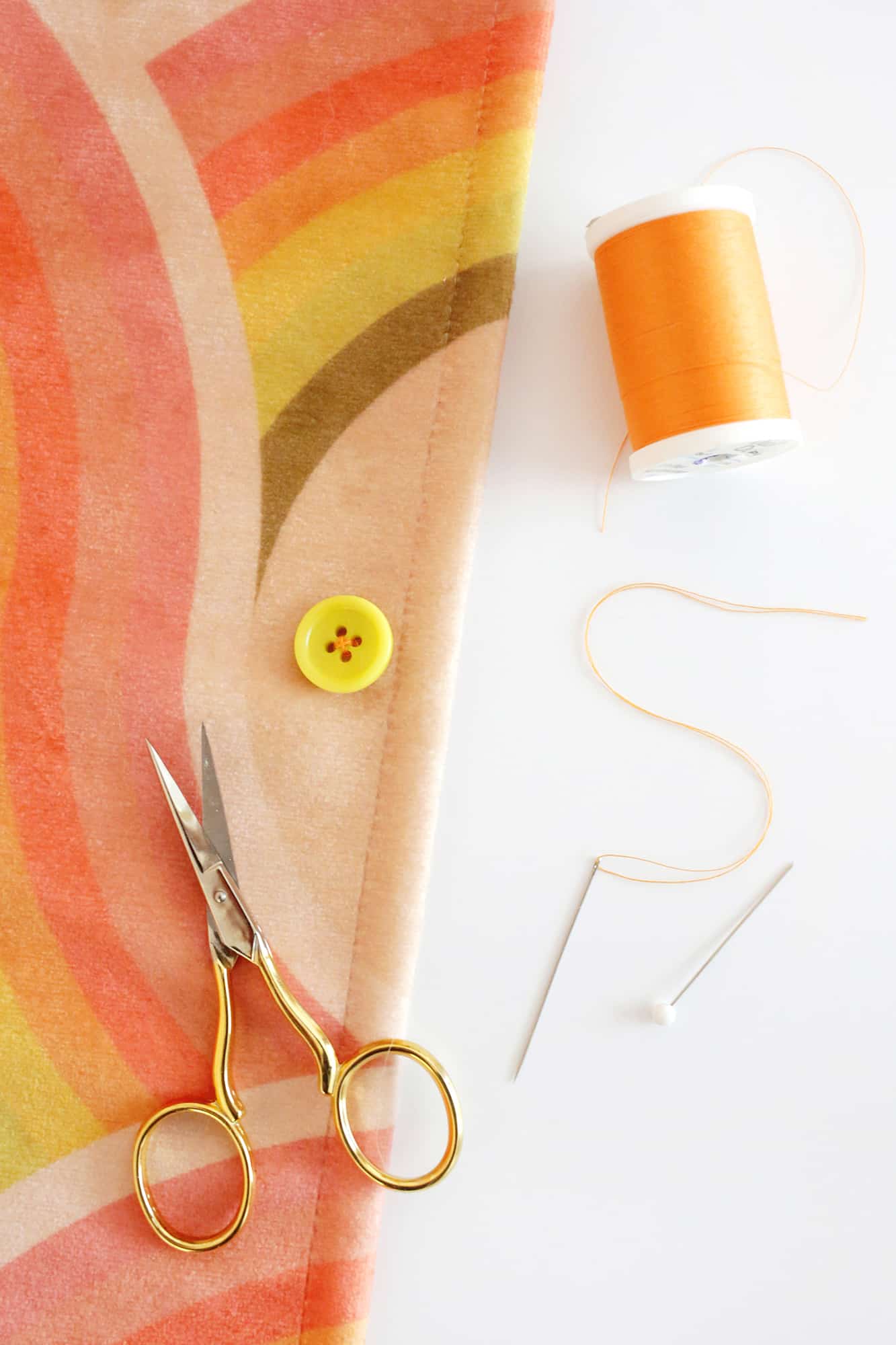 button sewn onto fabric