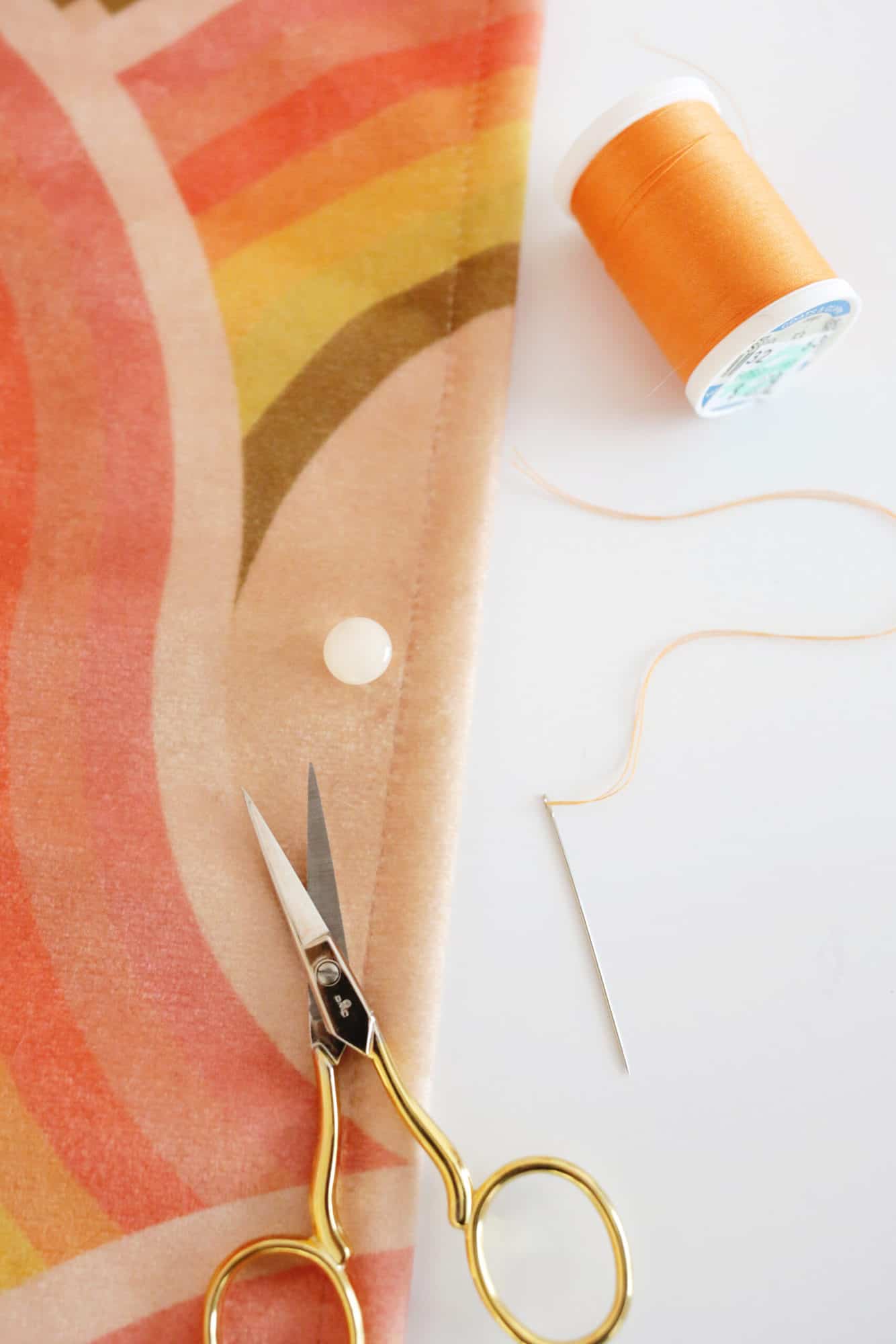 shank button sewn onto thread