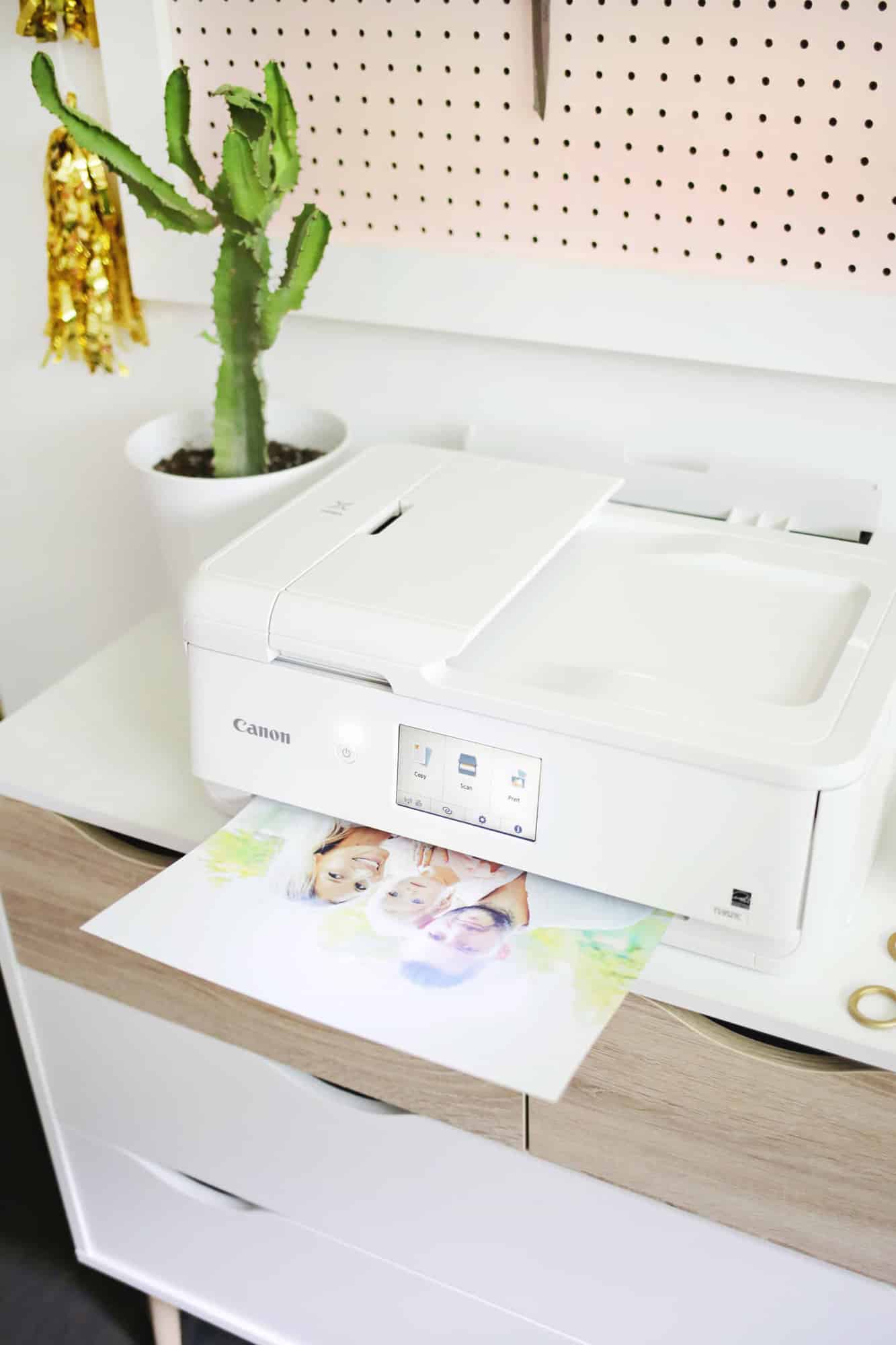 white printer printing a photo