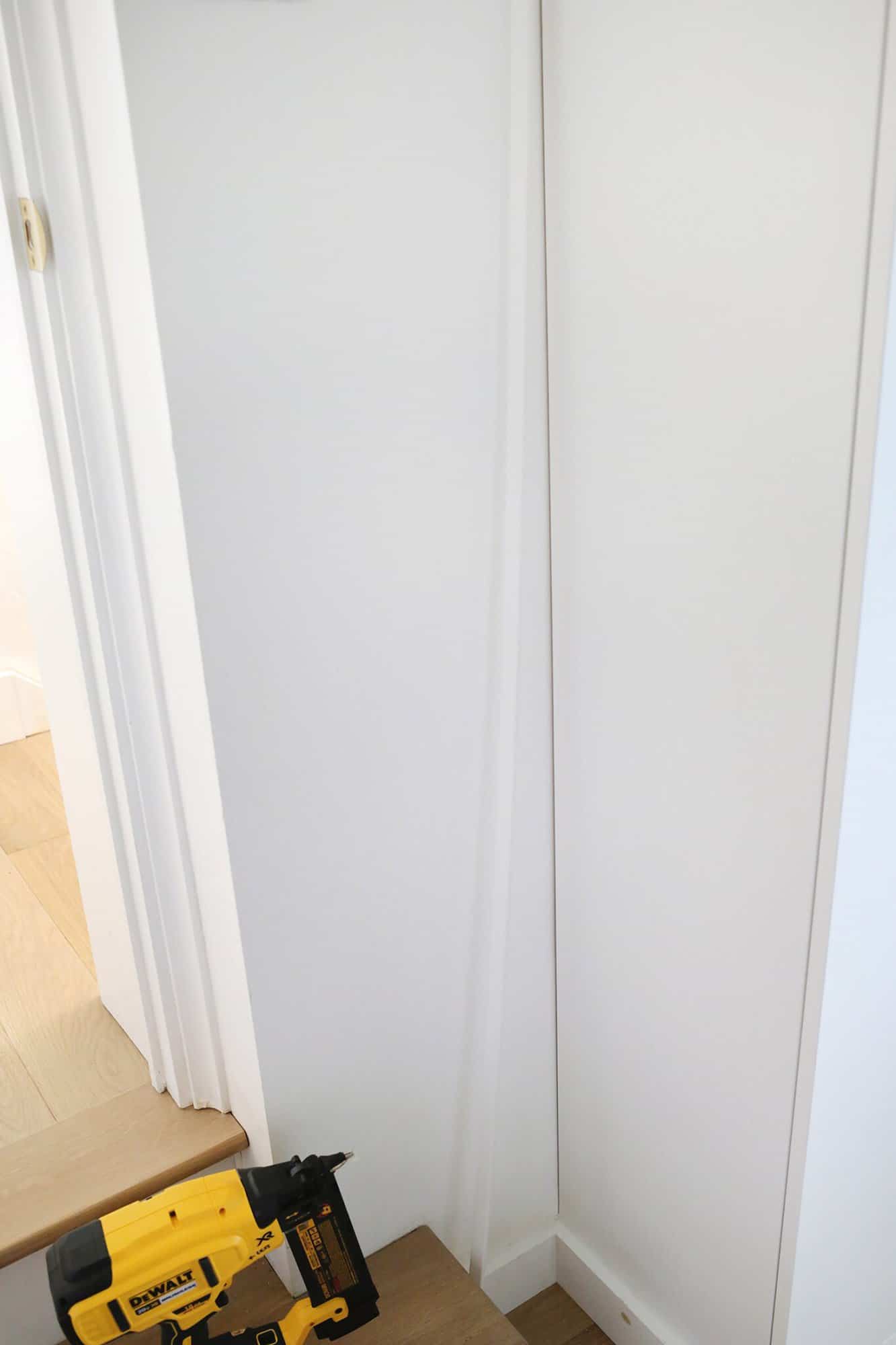 trim piece for wardrobe leaning against wall