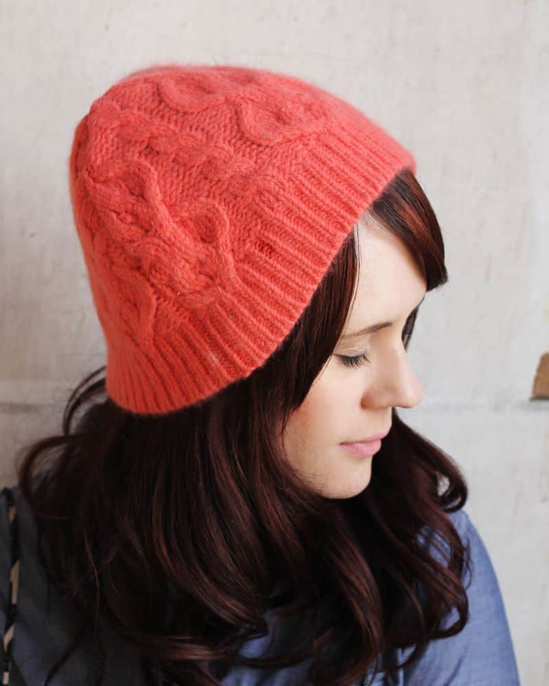 woman wearing red knit hat. 