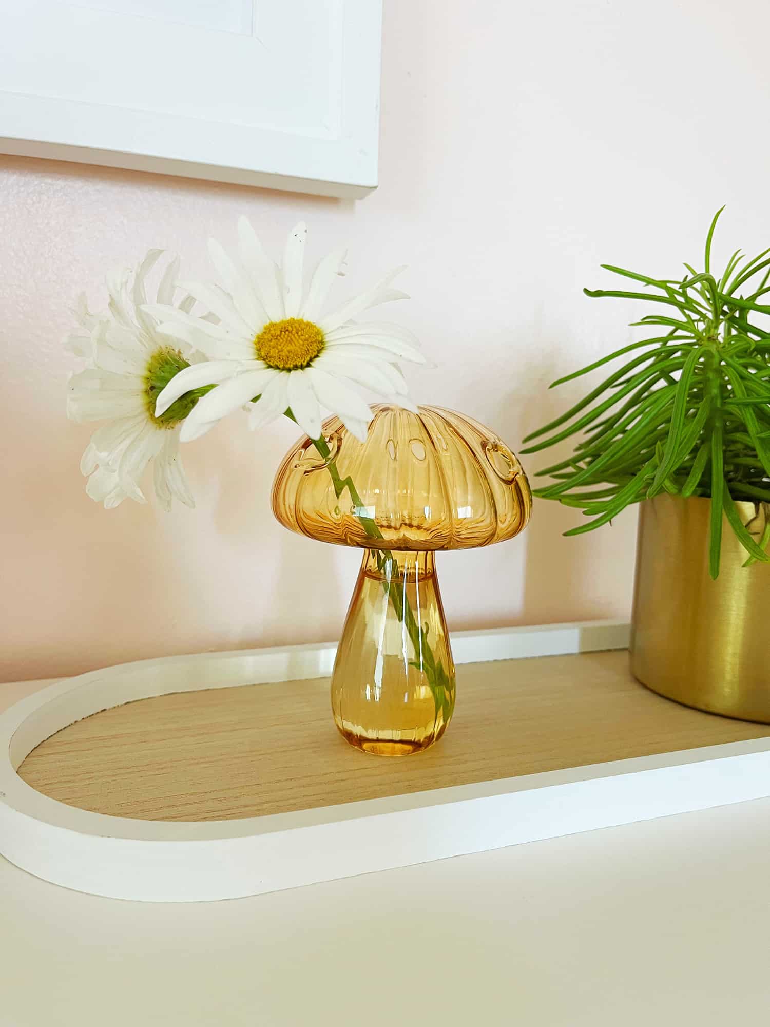 glass mushroom jar with fresh flowers
