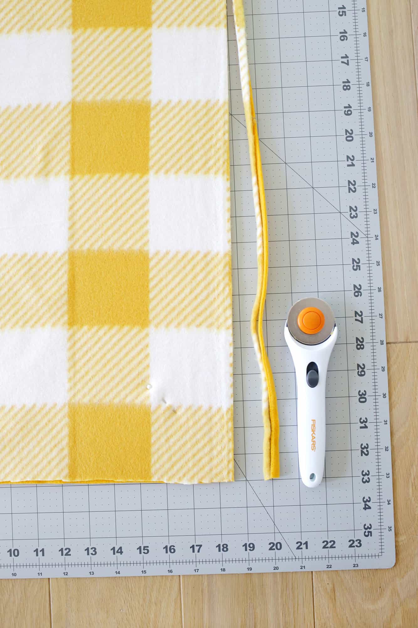 cut the fleece with a rotary cutter for even edges