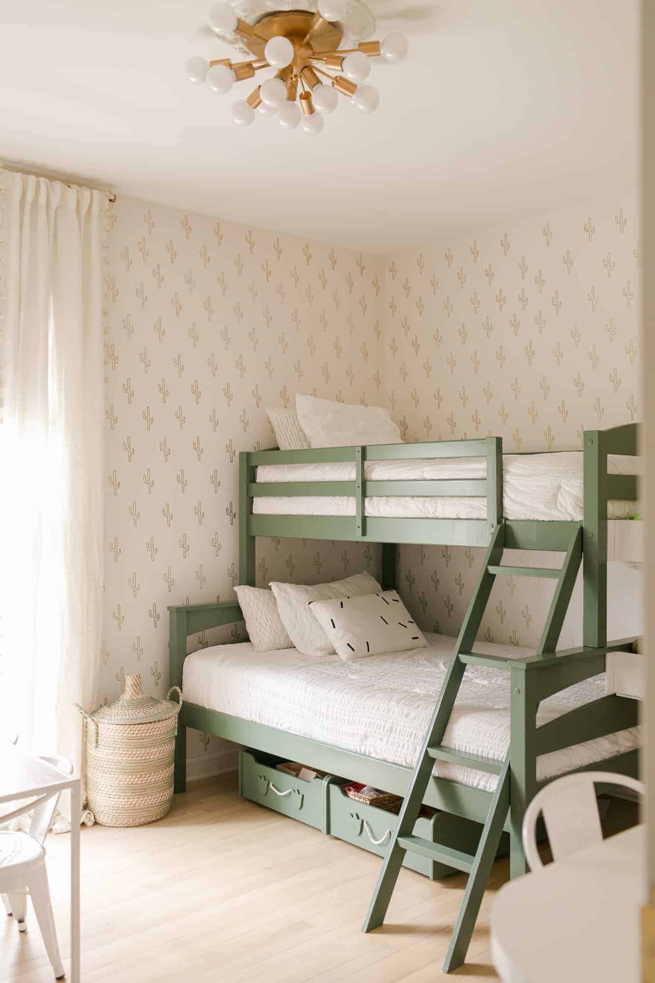 green bunk beds in kid's room