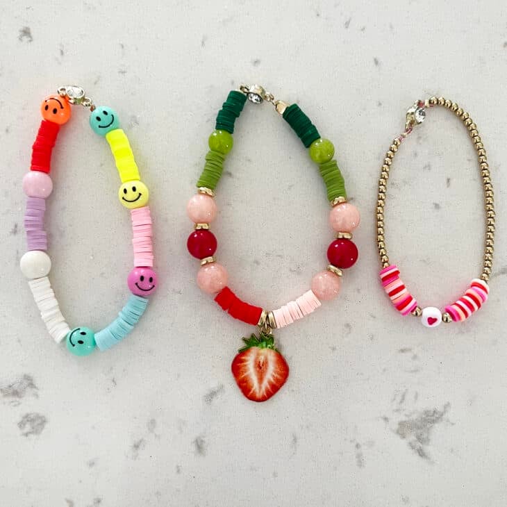 adding cute charms with clay bead bracelets