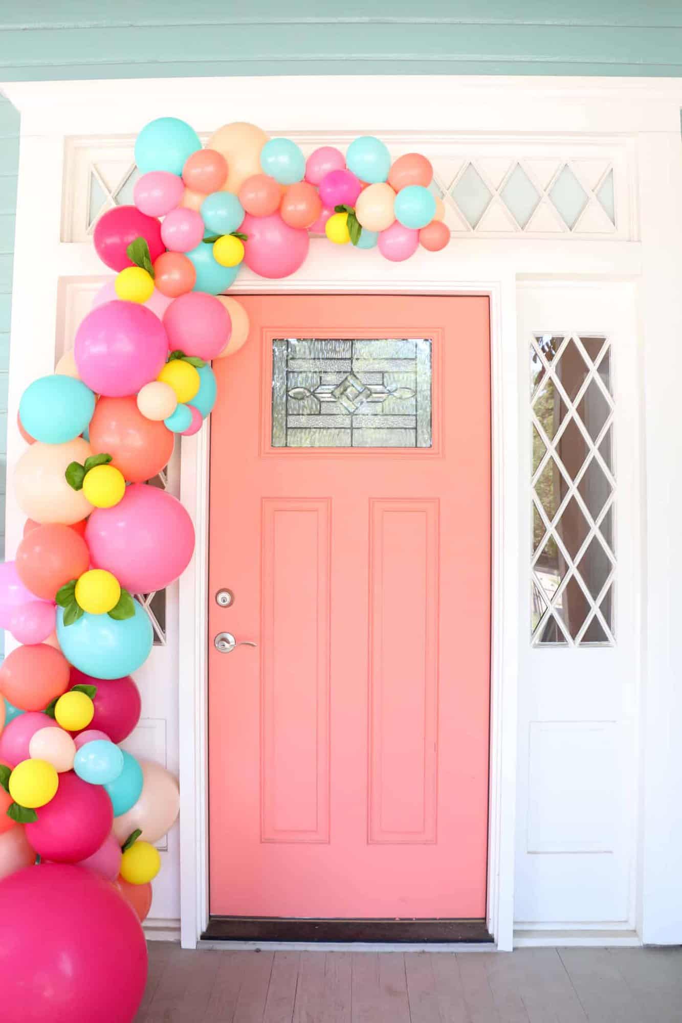 large balloon garland over front door