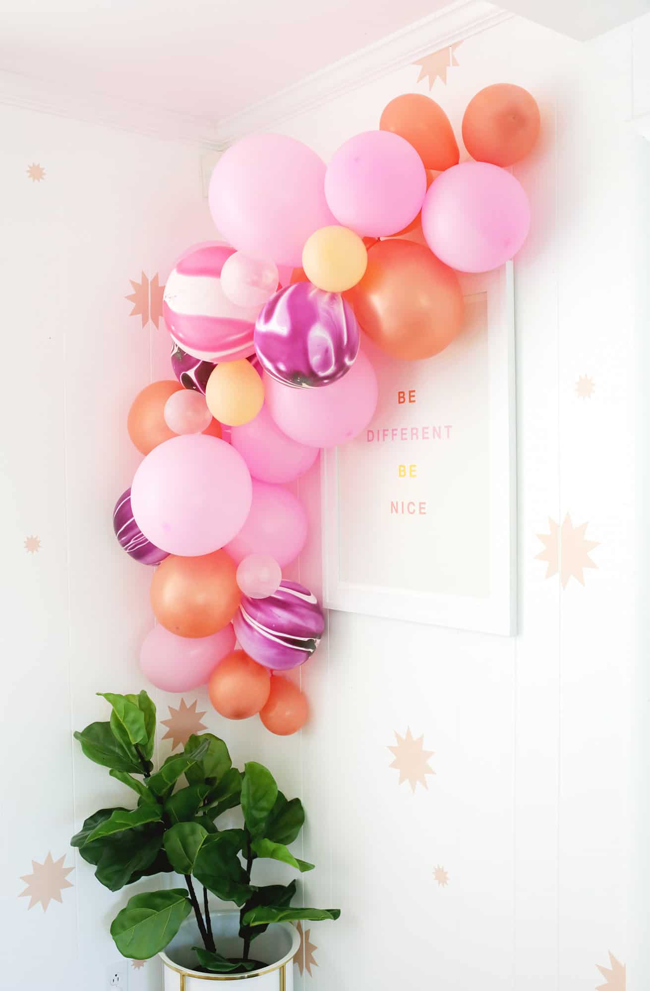 pink and purple balloon garland