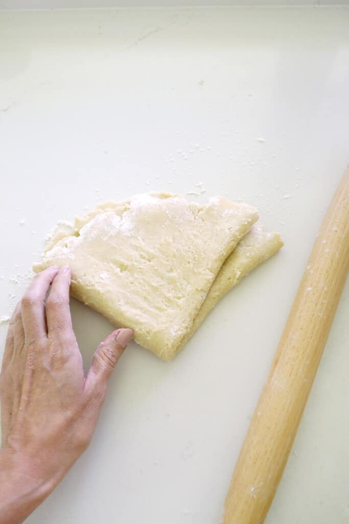 Rolling out dough for easy apple tart