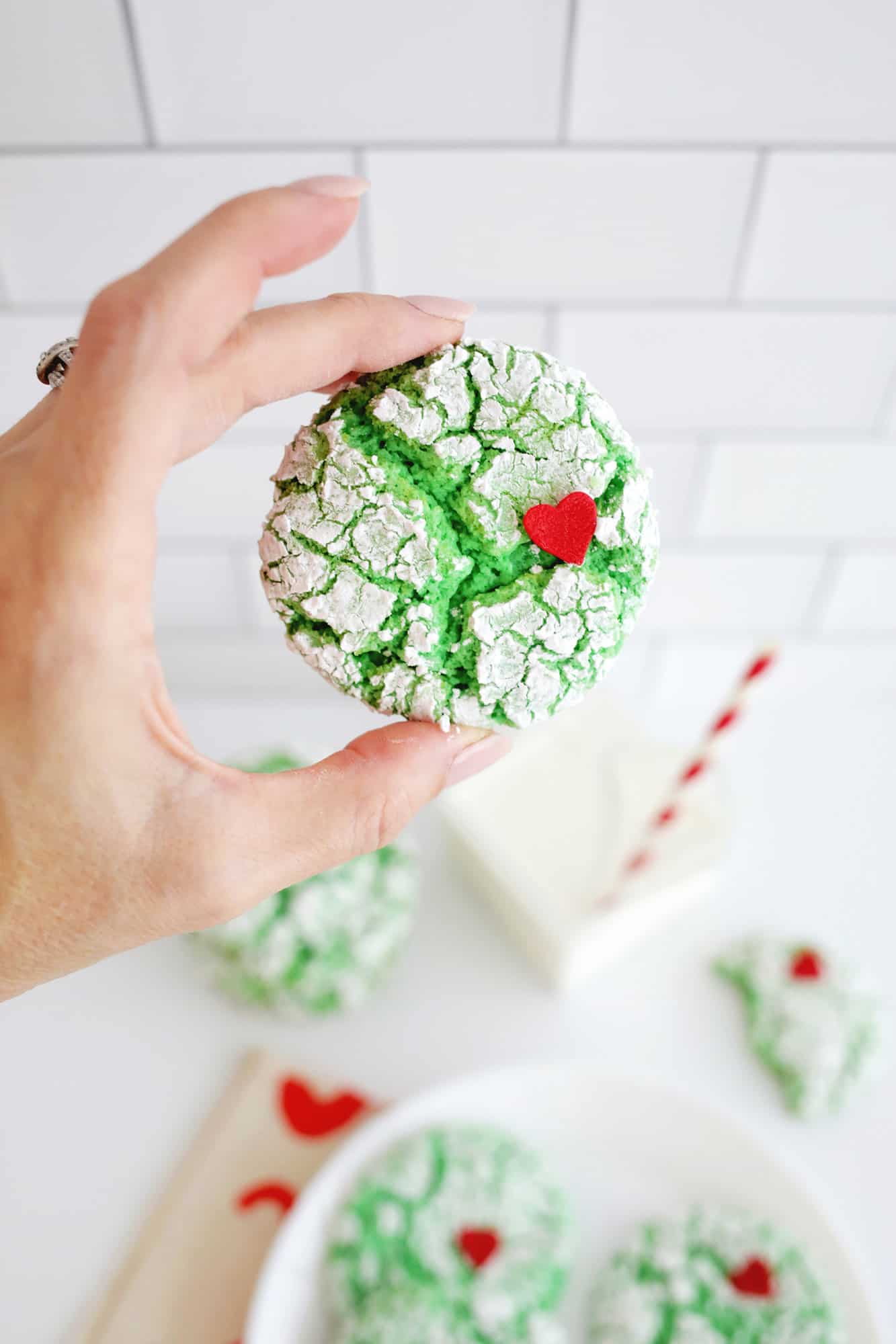 grinch cookie with heart sprinkle