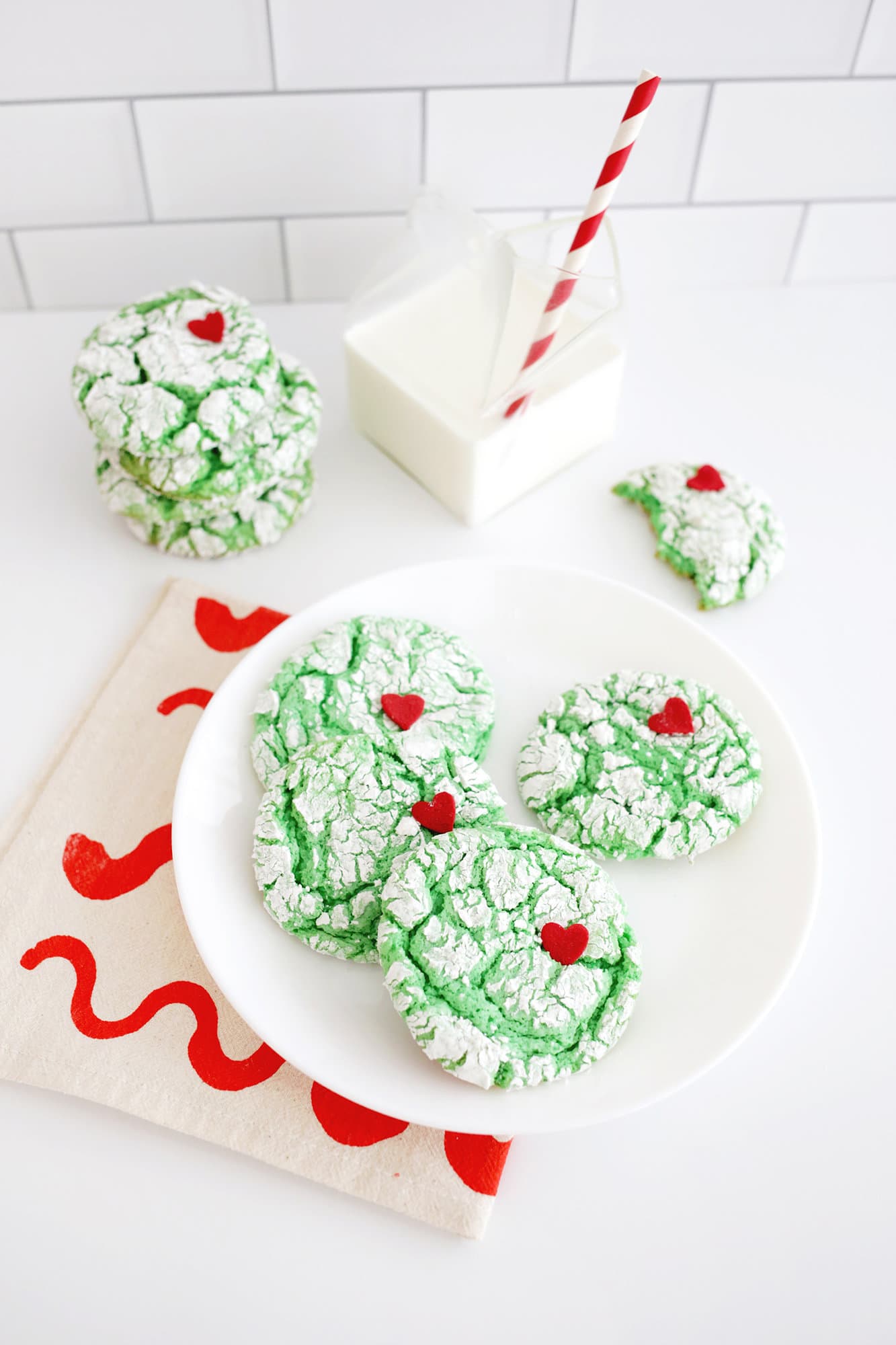 grinch cookies with glass of milk