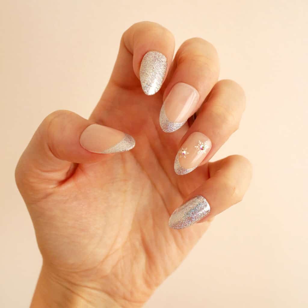 glitter and snowflake nail design