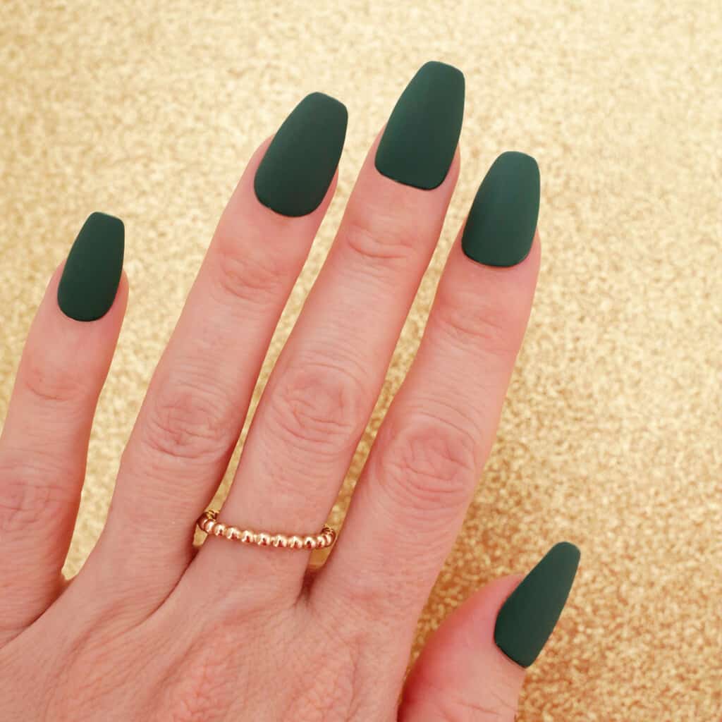 matte green christmas nail design