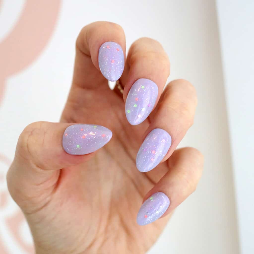 Pastel purple nails with pastel glitter for spring and easter