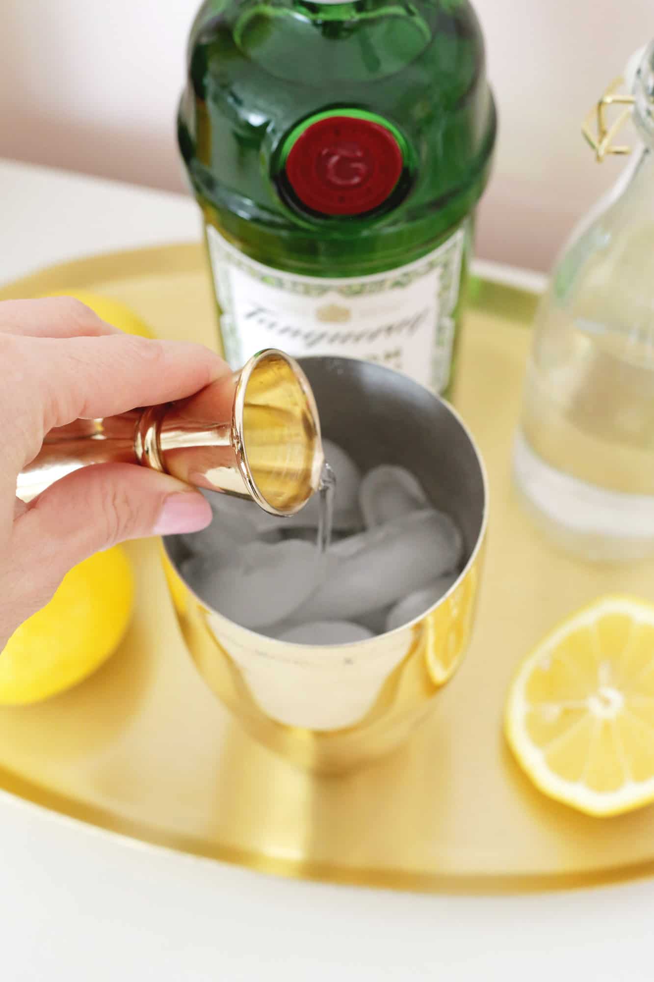 making a french 75 cocktail