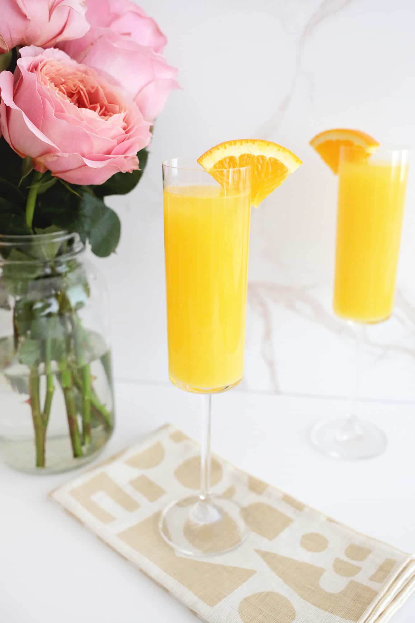 mimosa with orange wedge
