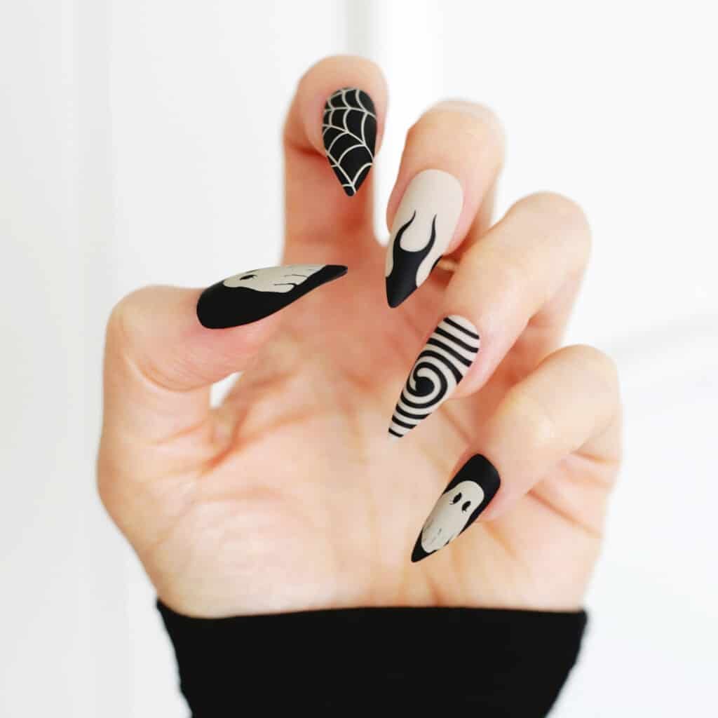 Halloween nail manicure idea with spiders and ghosts