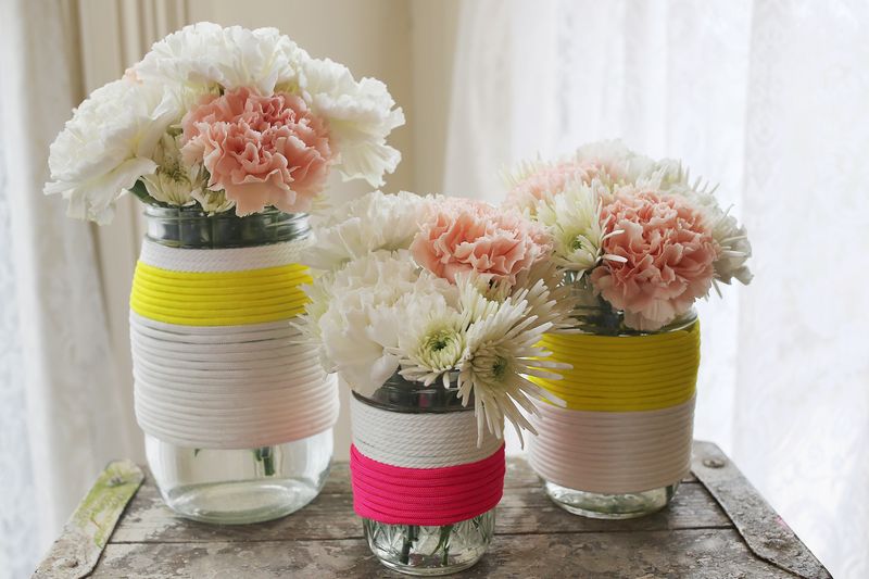 Jars wrapped in parachute cord for cute vases!