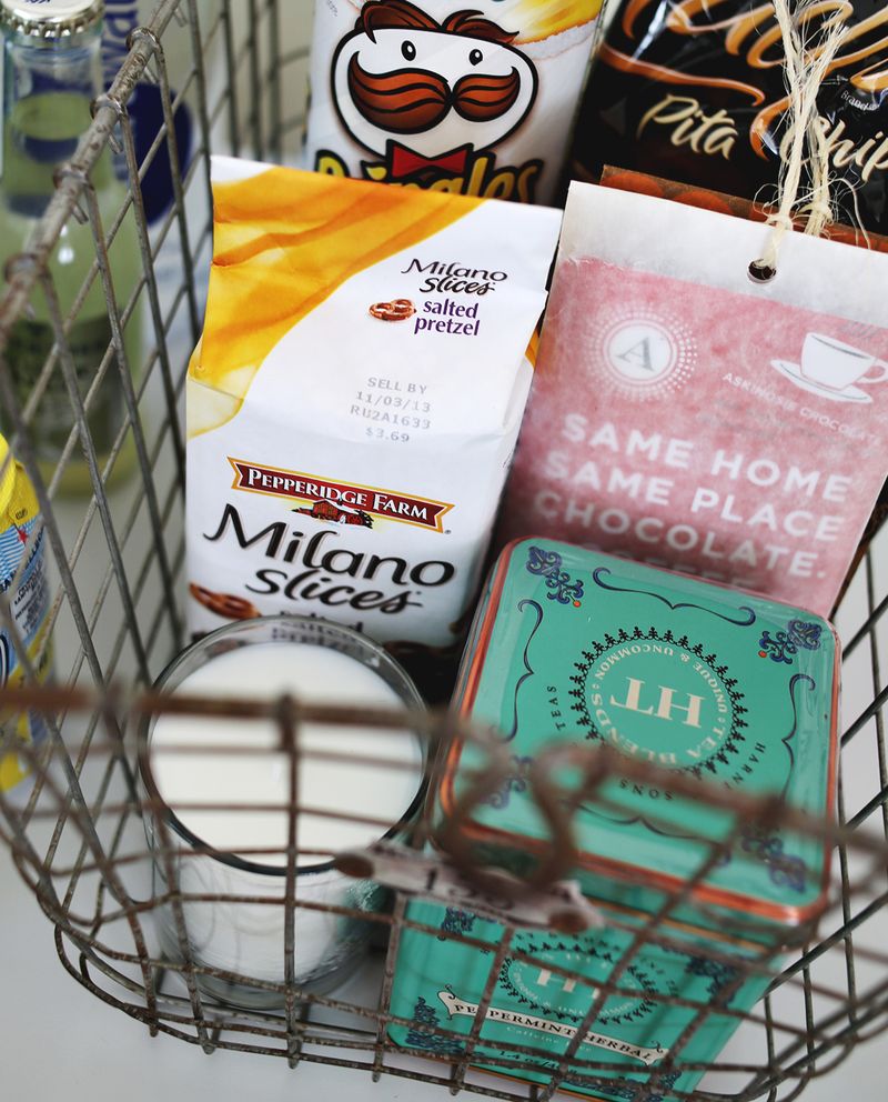 Create a fun cart for overnight guests with snacks and extra toiletries! via abeautifulmess.com 