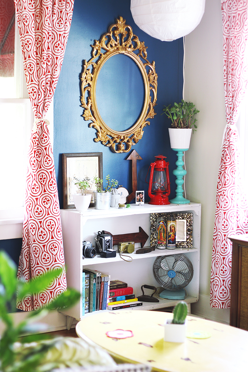 Love the blue wall and curtains!