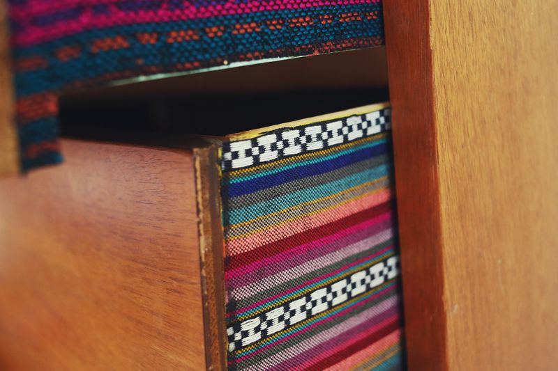 Try this: Fabric lined dresser drawers 