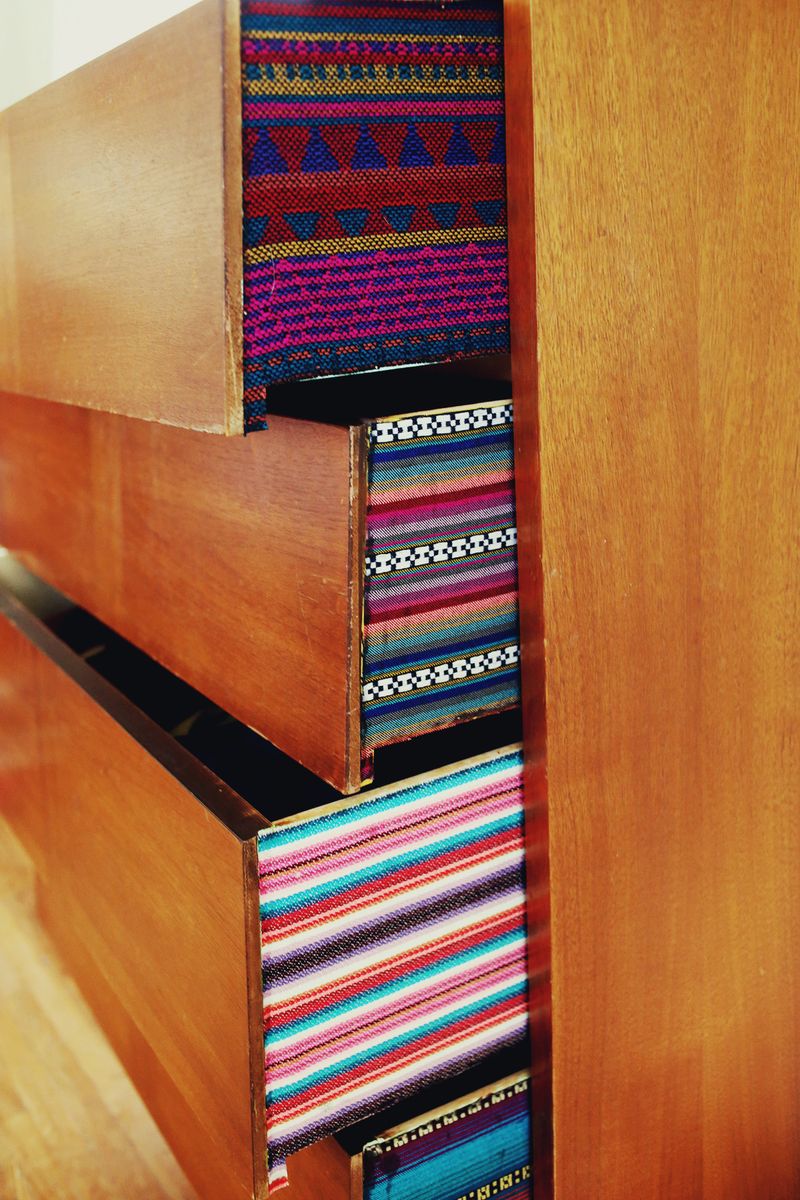 Try this: Fabric lined dresser drawers 